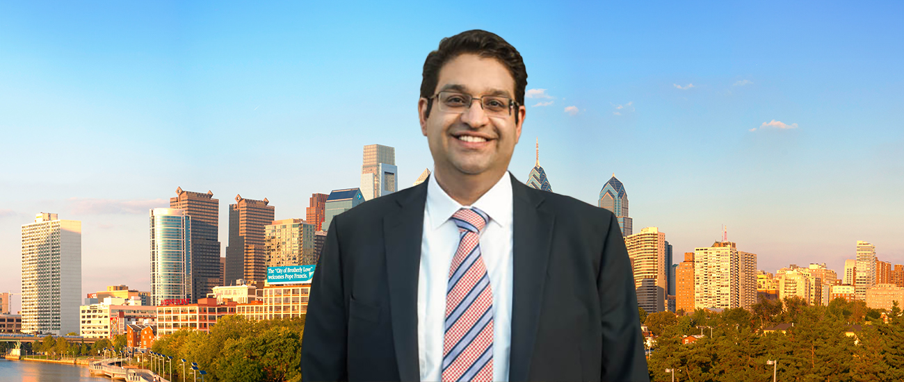 Cyrus Shaw with the Philadelphia skyline in the background